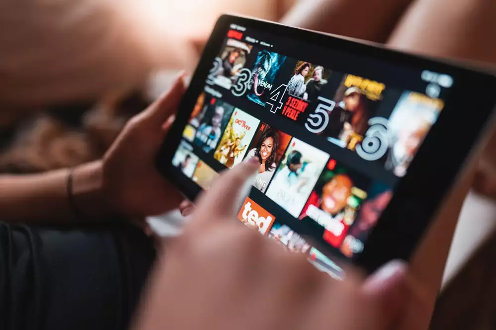 Člen Navíc Netflix